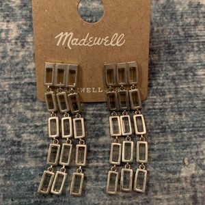 Dangly, silver earrings.